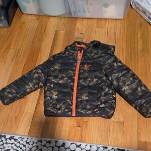 Nike Kids Camouflage Puffer Jacket with Orange Trim. Fleece Interior. Very Warm.